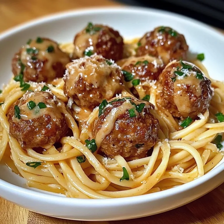 Delicious Parmesan linguine served with garlic butter meatballs
