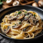 Caramelized leek and mushroom gruyere pasta served in a bowl