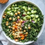 Kale quinoa salad with lemon dressing served in a bowl