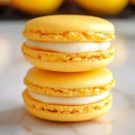 Lemon Meringue Pie Macarons with vibrant lemon filling and meringue topping